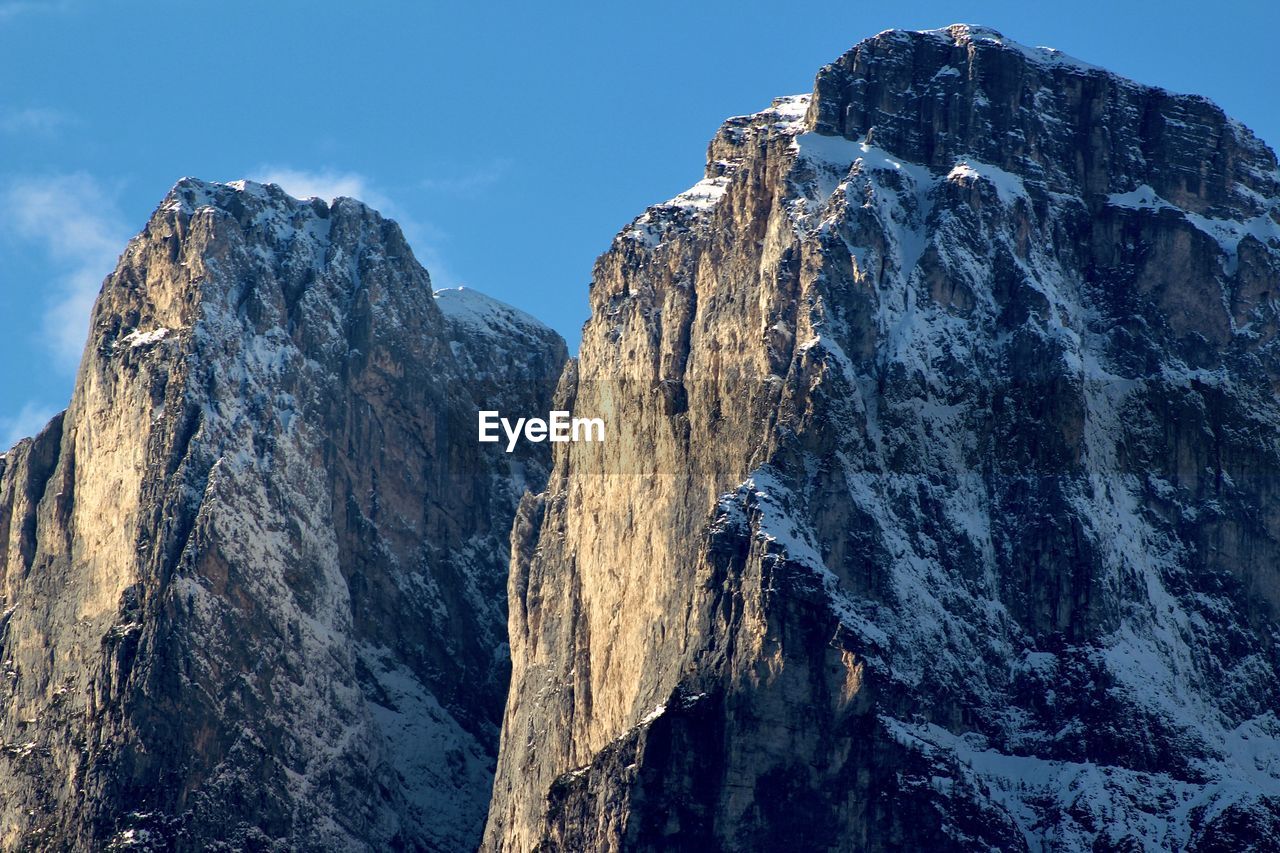 Scenic view of rocky mountains against sky