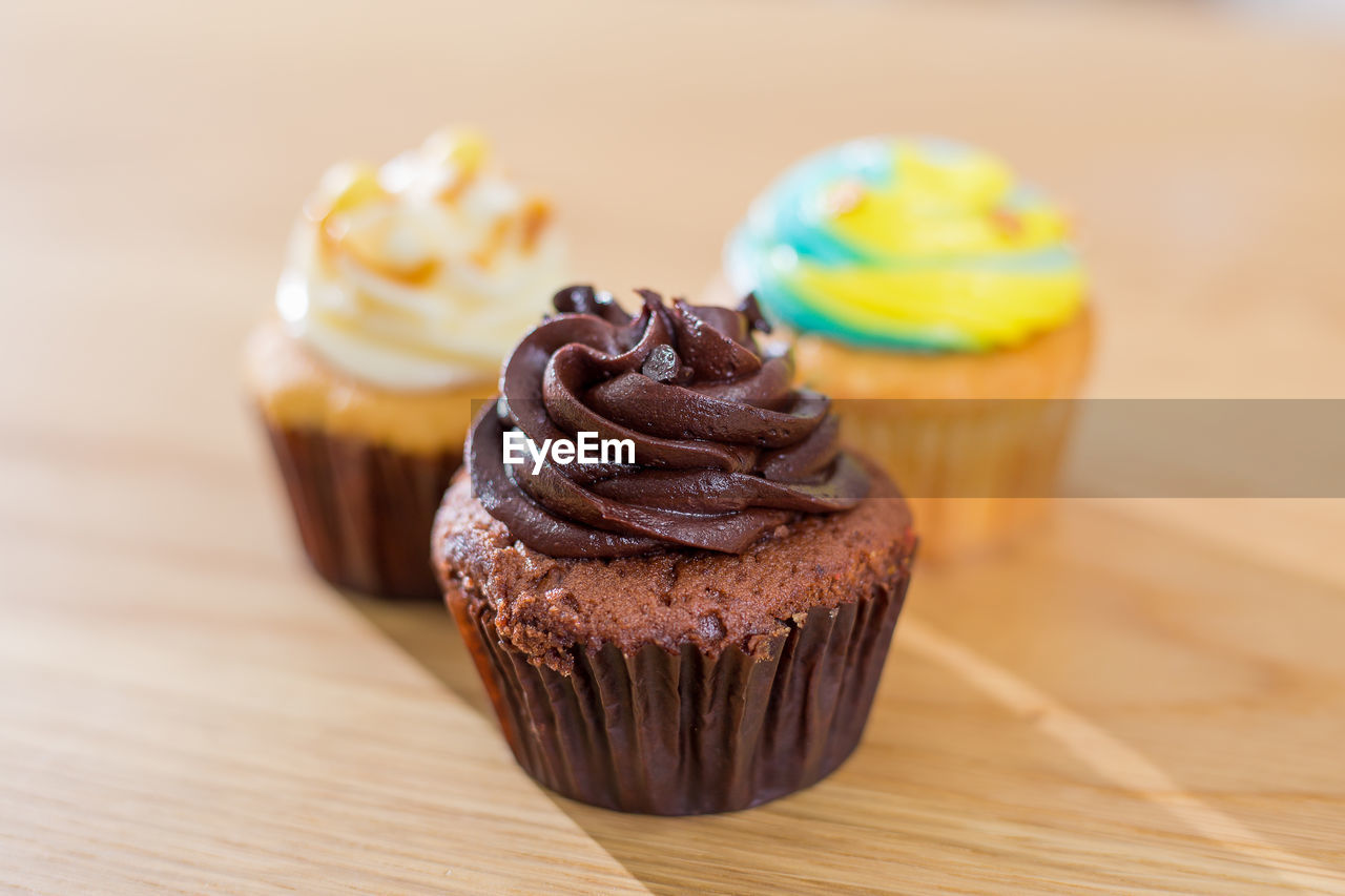 Close-up of cupcakes on table