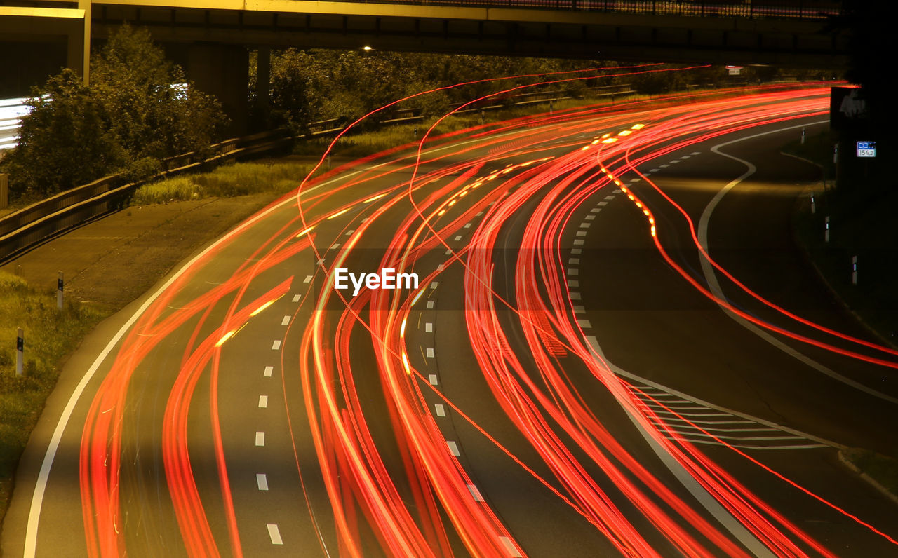 Light trails on road at night