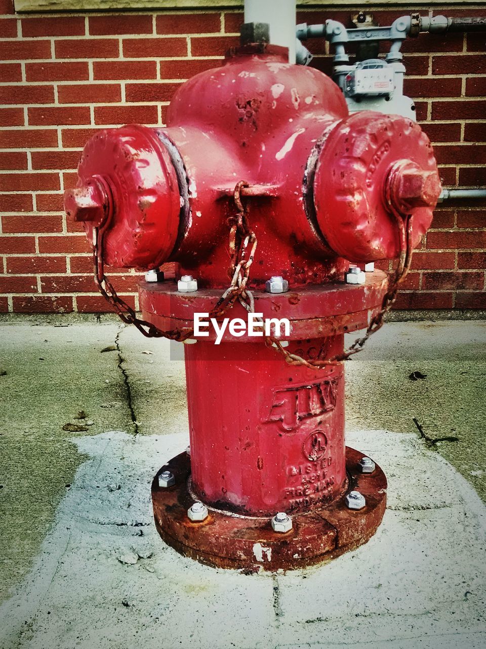 CLOSE-UP OF RED FIRE HYDRANT