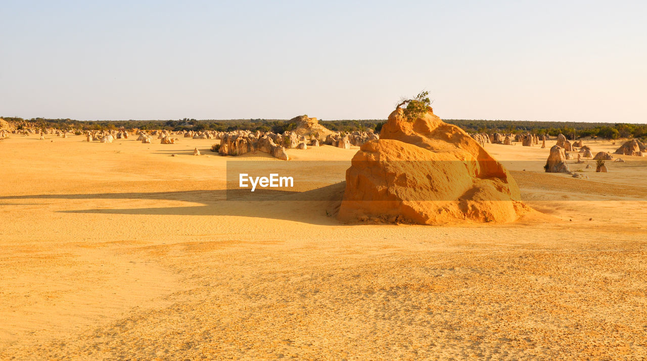 Rocks against clear sky at desert