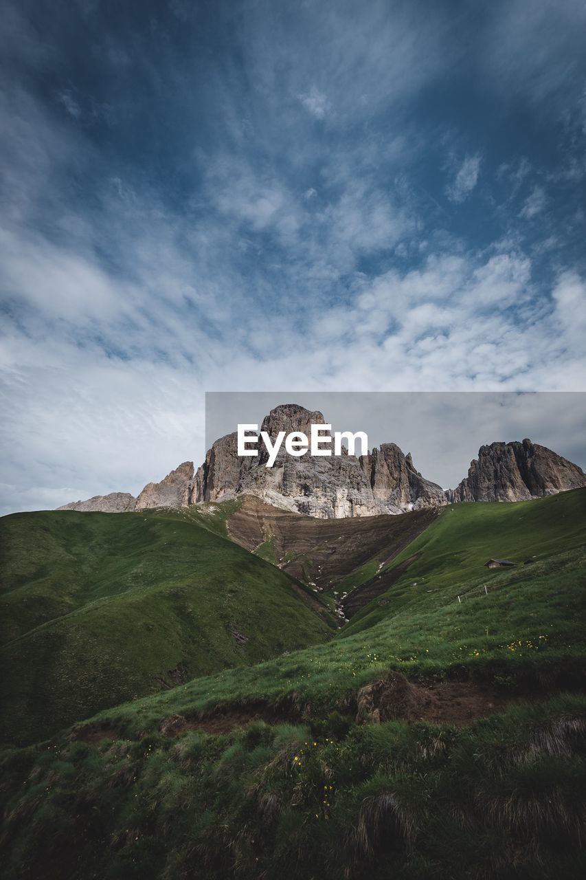 Scenic view of landscape and mountains against sky