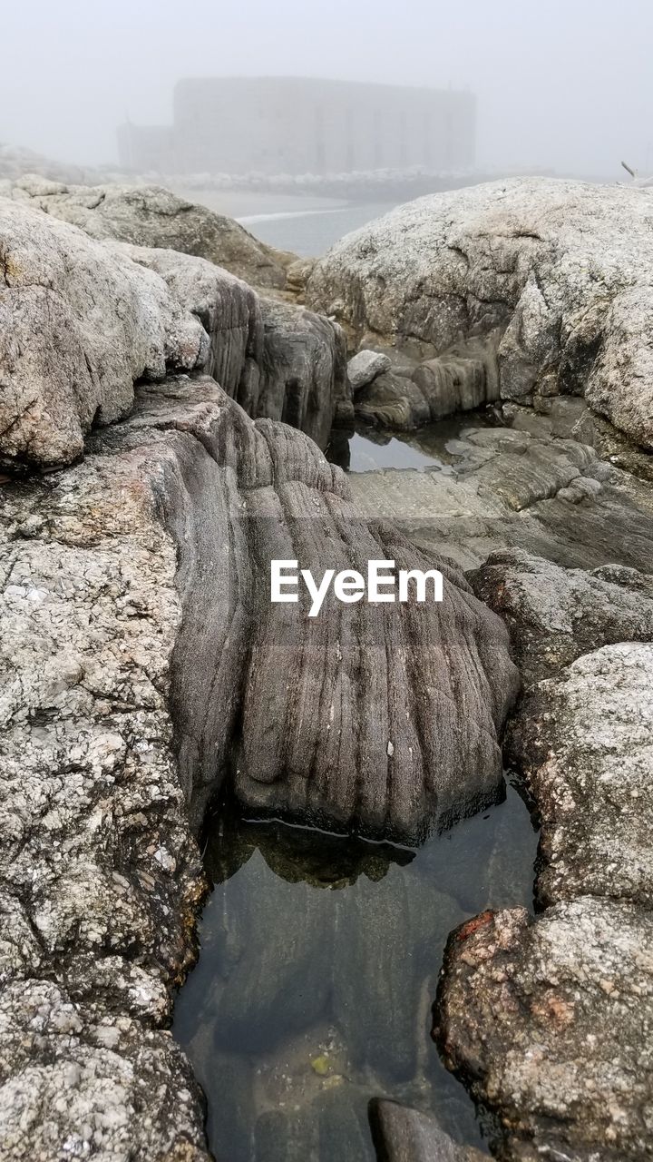 High angle view of rocks in river