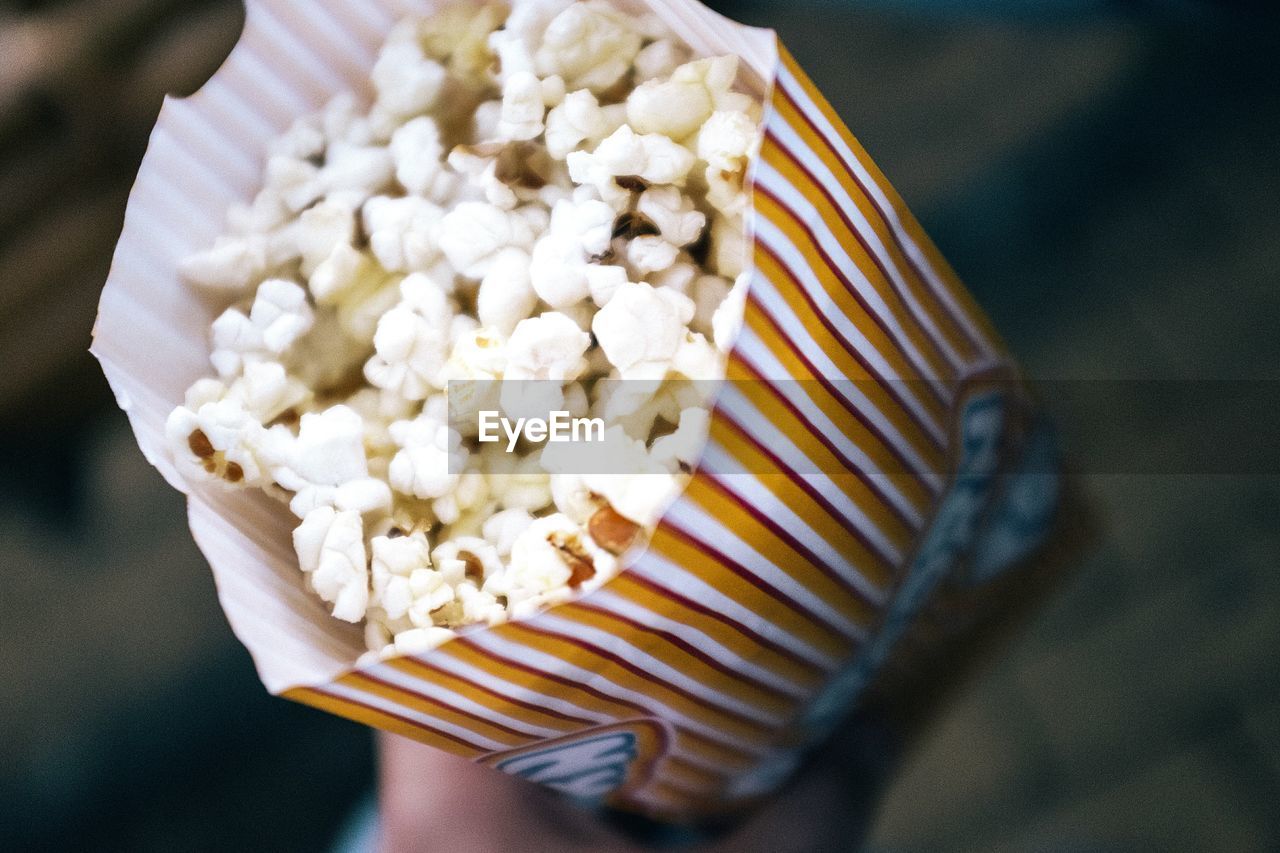 High angle view of popcorn in paper packet