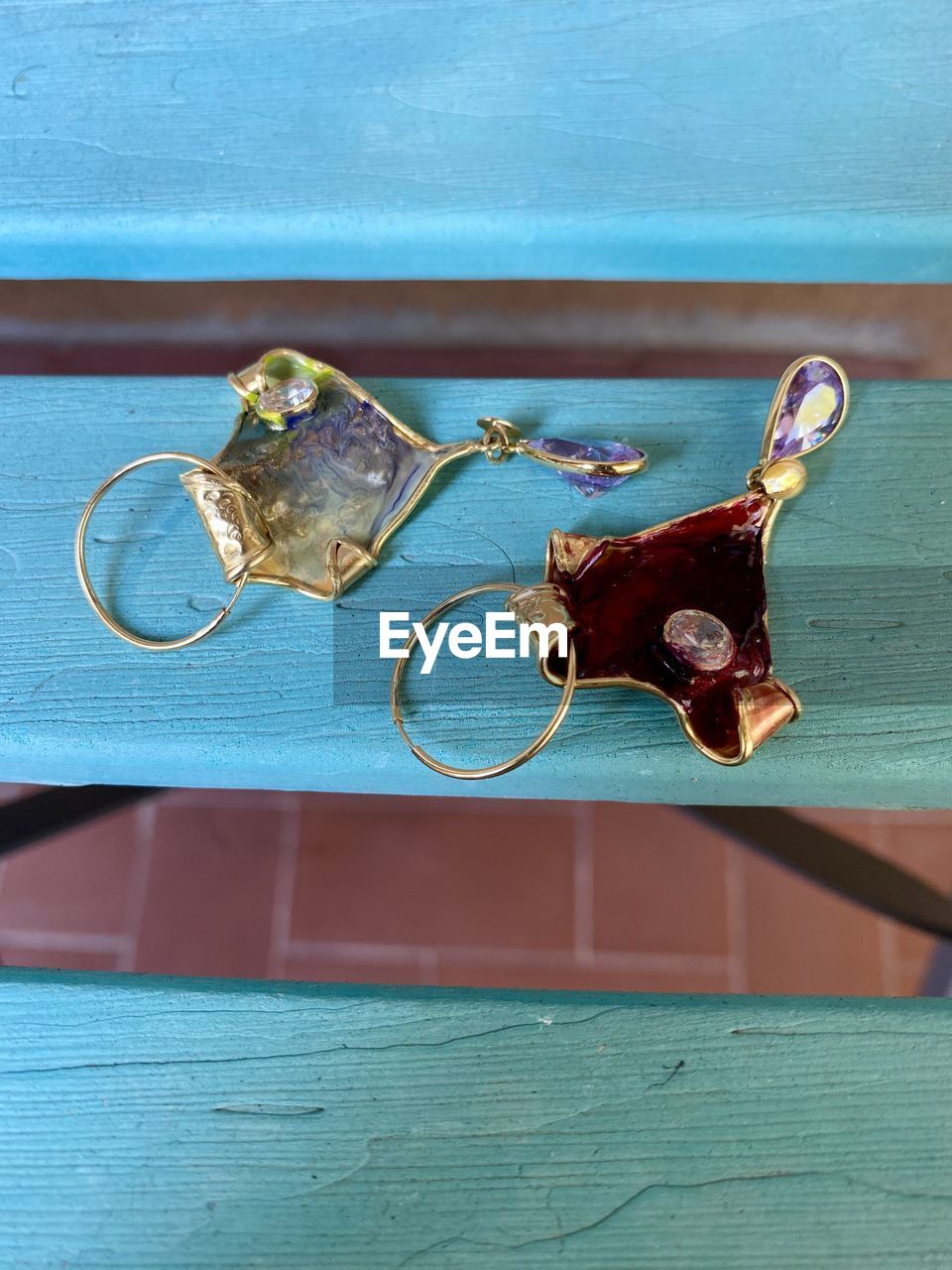 blue, no people, day, glasses, wood, high angle view, indoors, still life