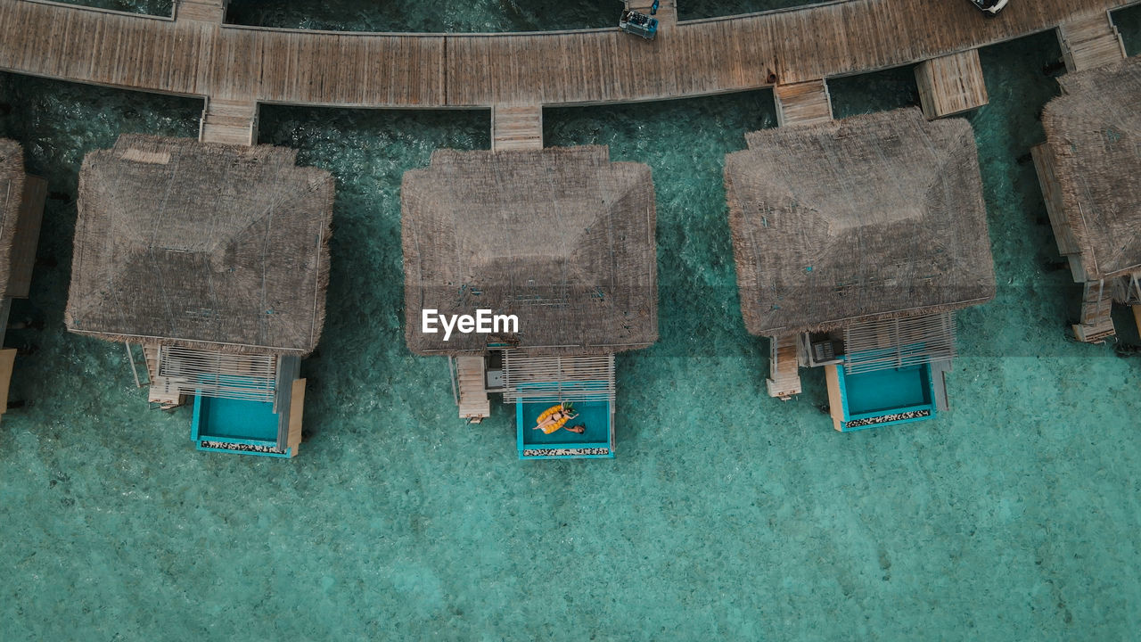 Drone footage of water bungalow in maldives islands