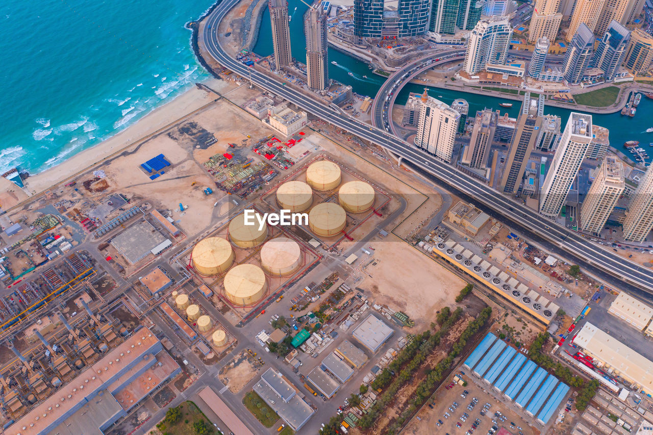 HIGH ANGLE VIEW OF SWIMMING POOL AT SEASIDE