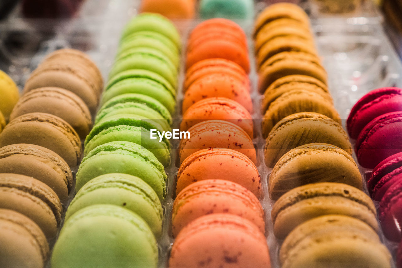 Close-up of multi colored macarons in store