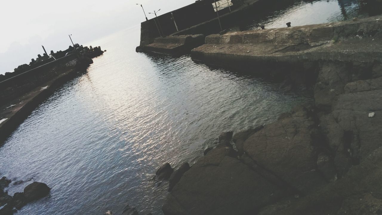 Tilt image of river against sky