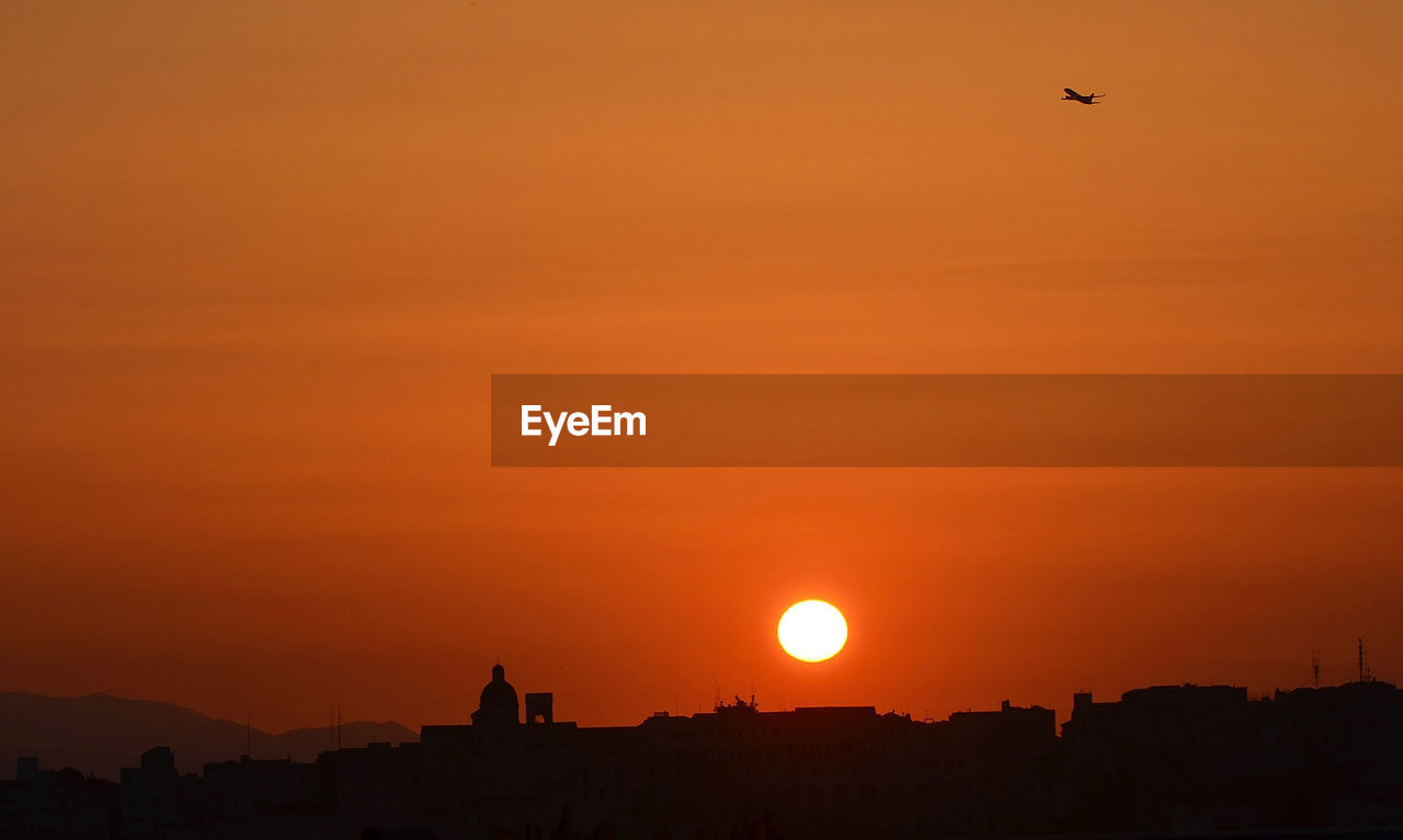 VIEW OF ORANGE SUNSET