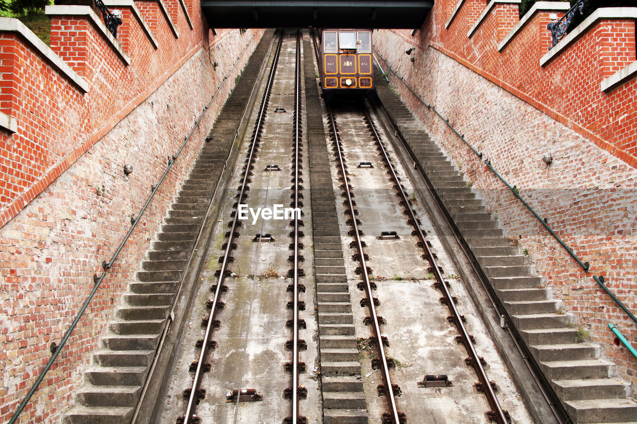 HIGH ANGLE VIEW OF RAILROAD TRACKS AT STATION