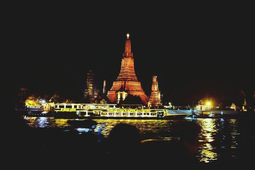 VIEW OF ILLUMINATED BUILDINGS AT NIGHT