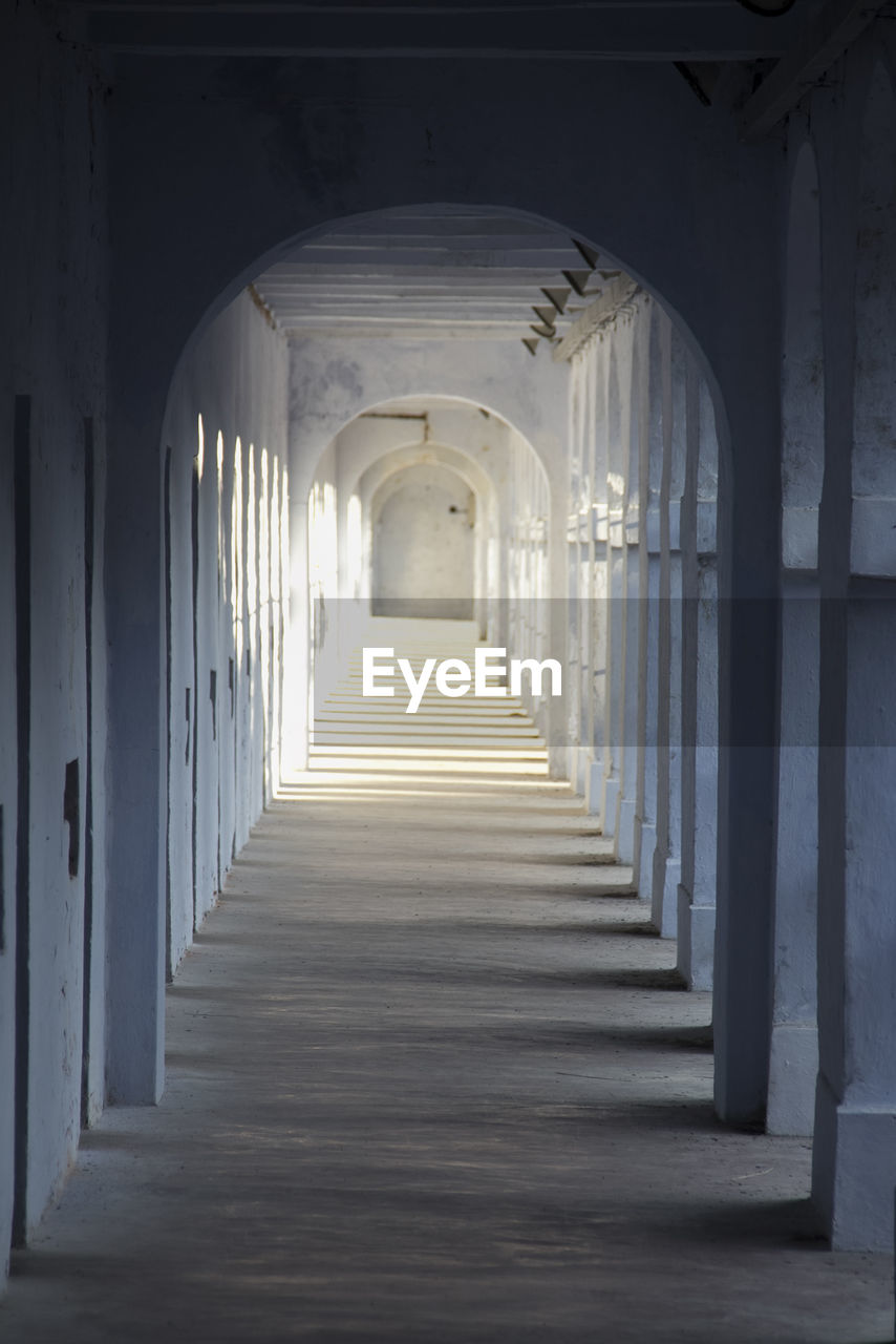 CORRIDOR OF HISTORIC BUILDING WITH ARCHWAY