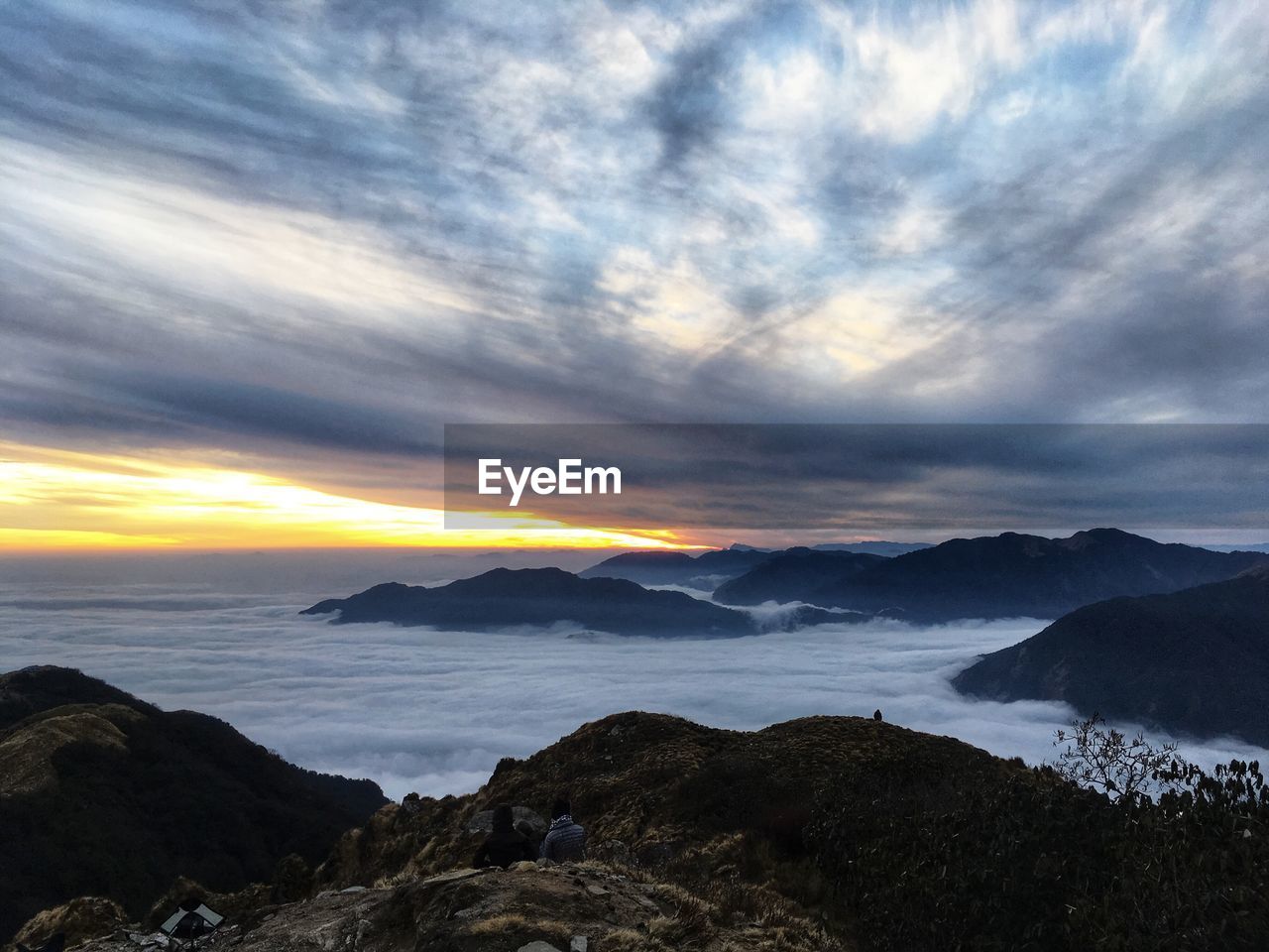 Scenic view of sea against sky at sunset