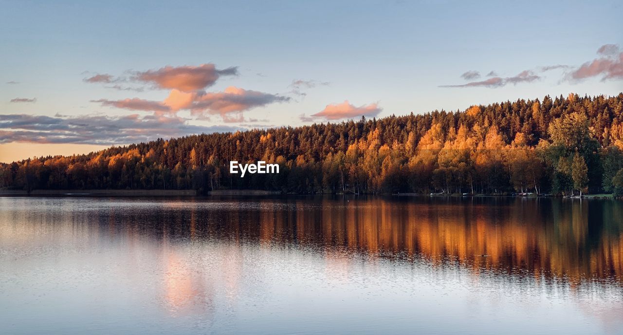 Scenic view of lake against sky during autumn