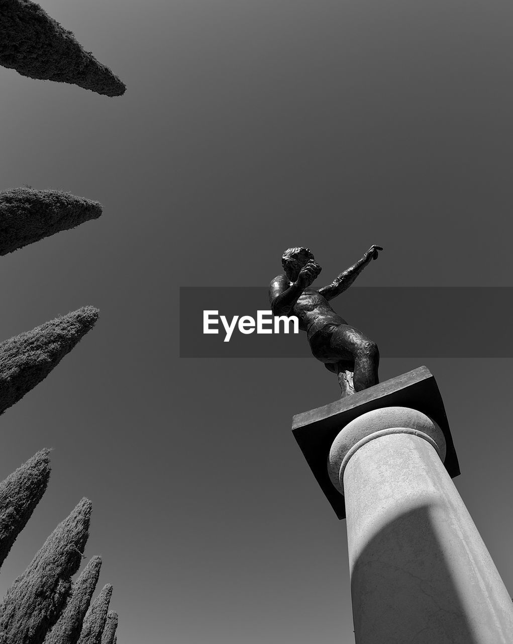 Low angle view of statue against clear sky