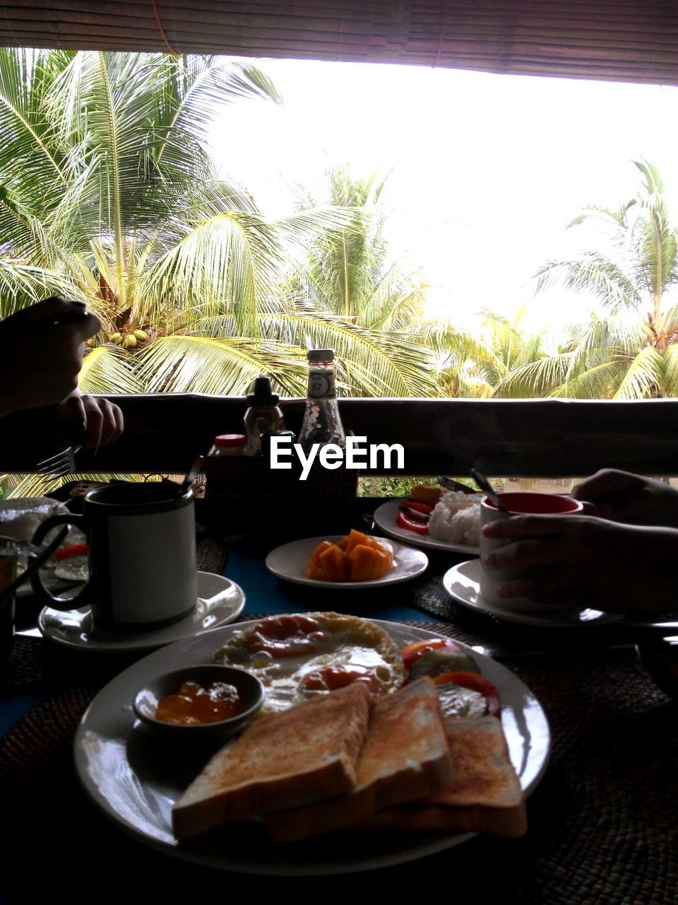 CLOSE-UP OF BREAKFAST ON TABLE IN KITCHEN