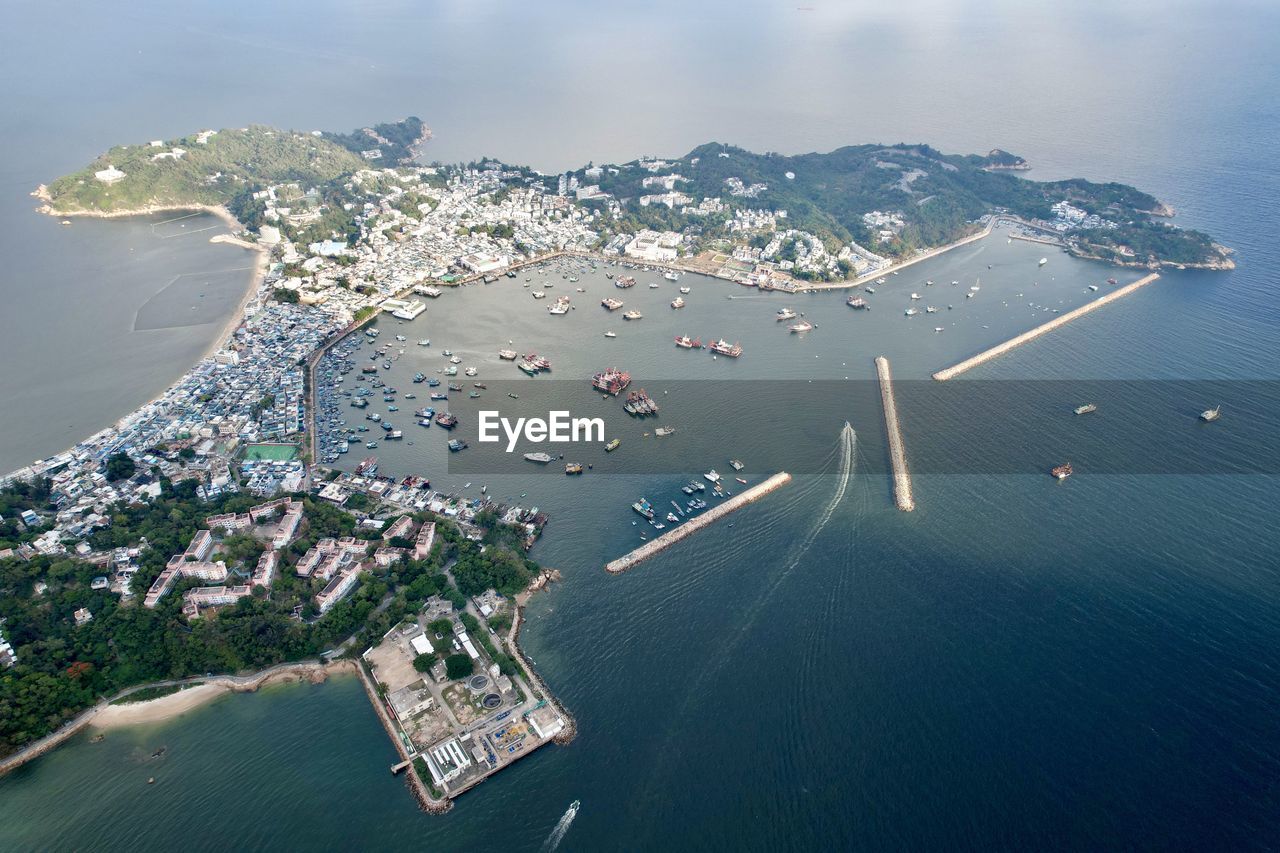 High angle view of cityscape and sea