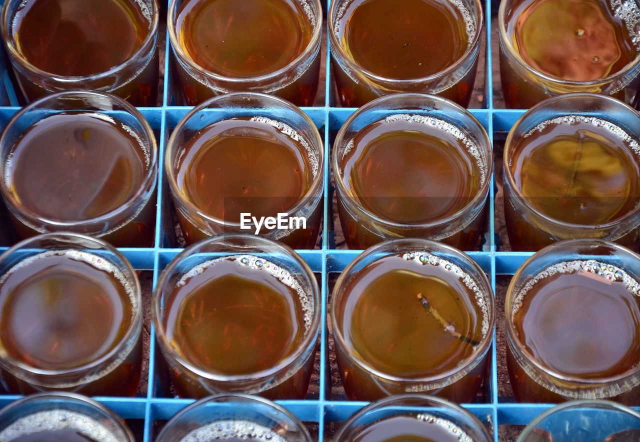 Close-up of drinks in crate