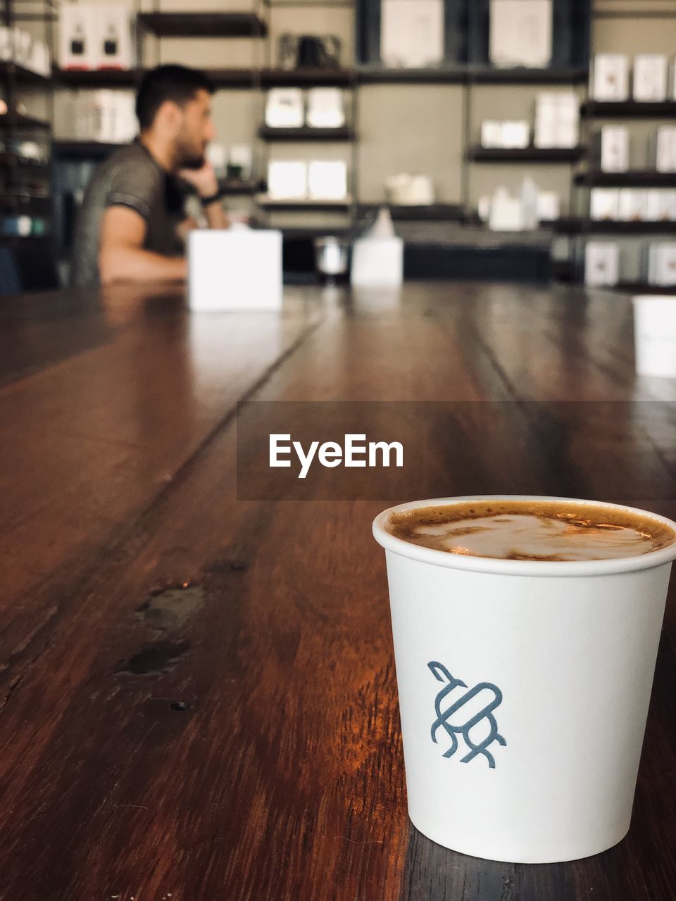 COFFEE CUPS ON TABLE