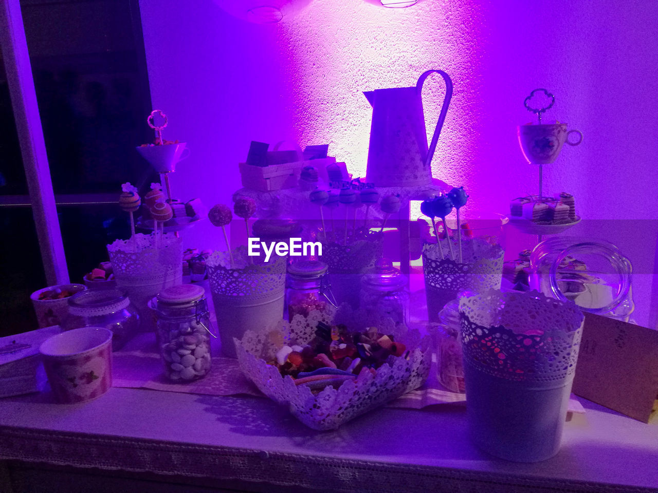 CLOSE-UP OF ICE CREAM IN GLASS ON TABLE