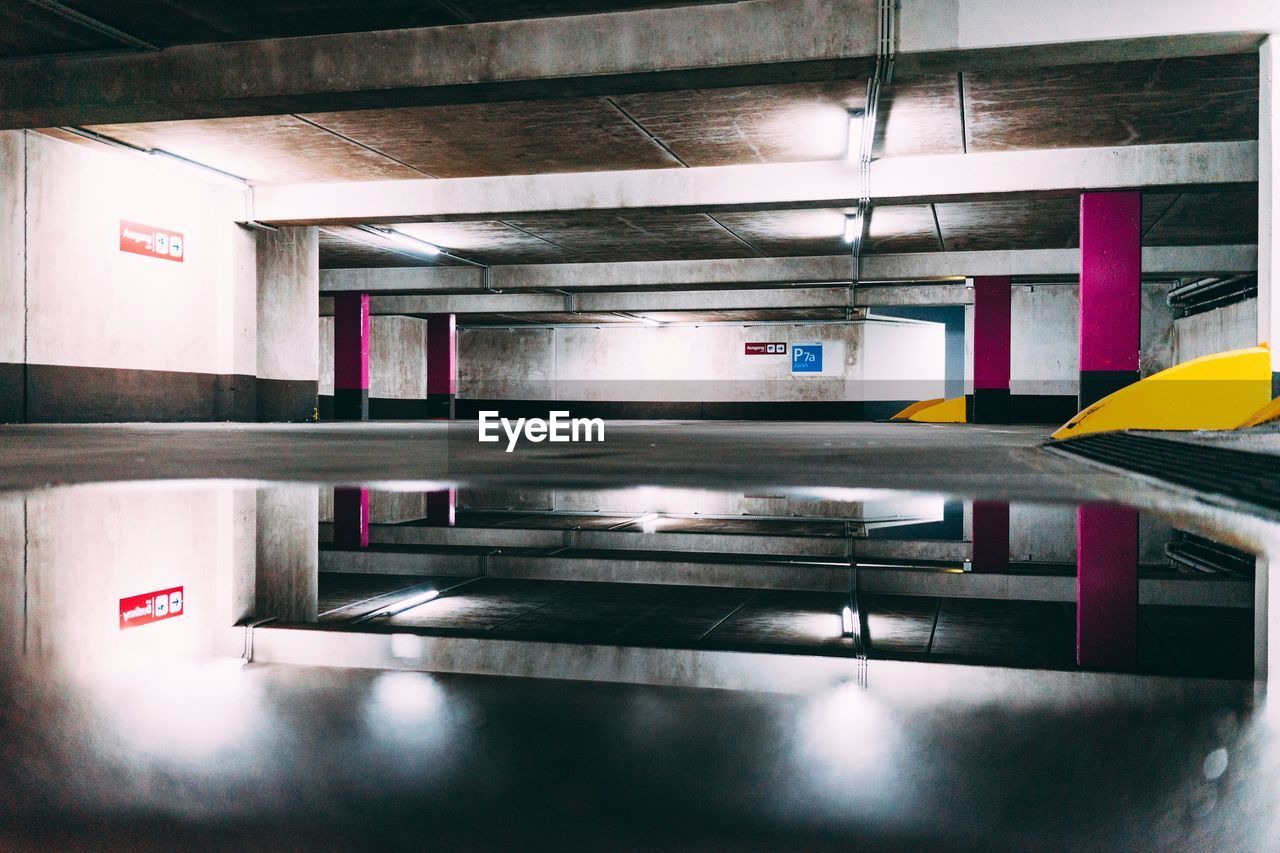 INTERIOR OF ILLUMINATED EMPTY UNDERGROUND