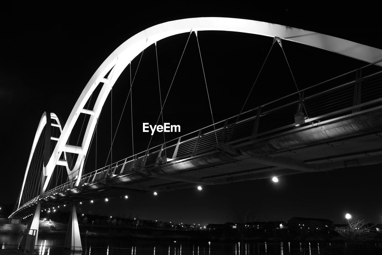 LOW ANGLE VIEW OF SUSPENSION BRIDGE AGAINST SKY