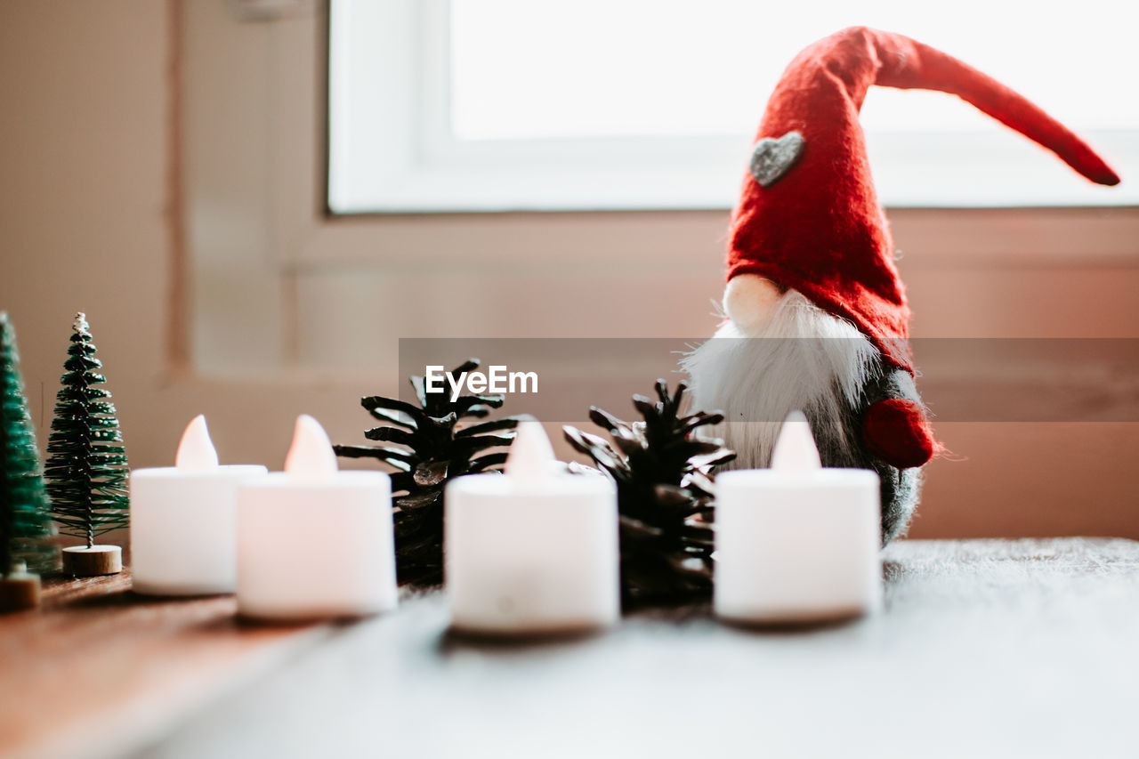 Close-up of christmas ornaments on table