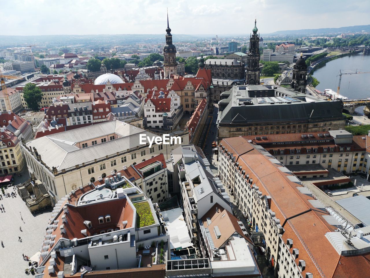 HIGH ANGLE VIEW OF BUILDINGS AGAINST SKY