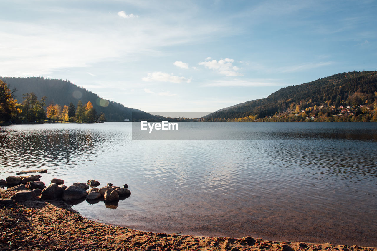 Scenic view of lake against sky. scenic view of gerardmer's lake. 