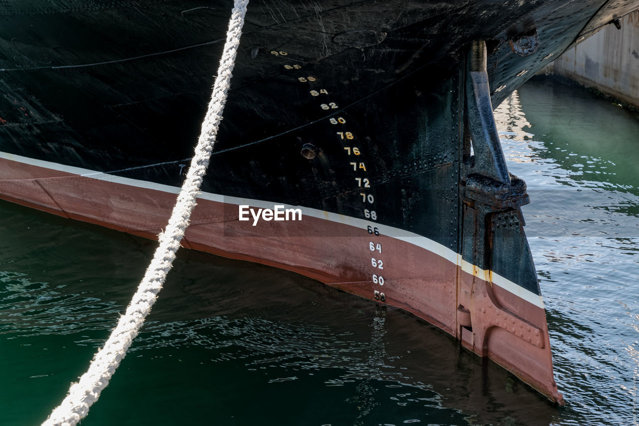 High angle view of rope against ship in sea