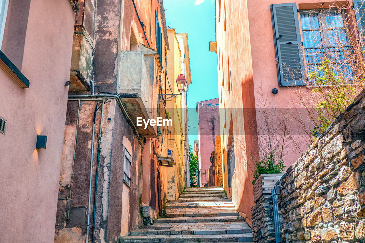 Narrow alley amidst buildings in city bastia france corsica 