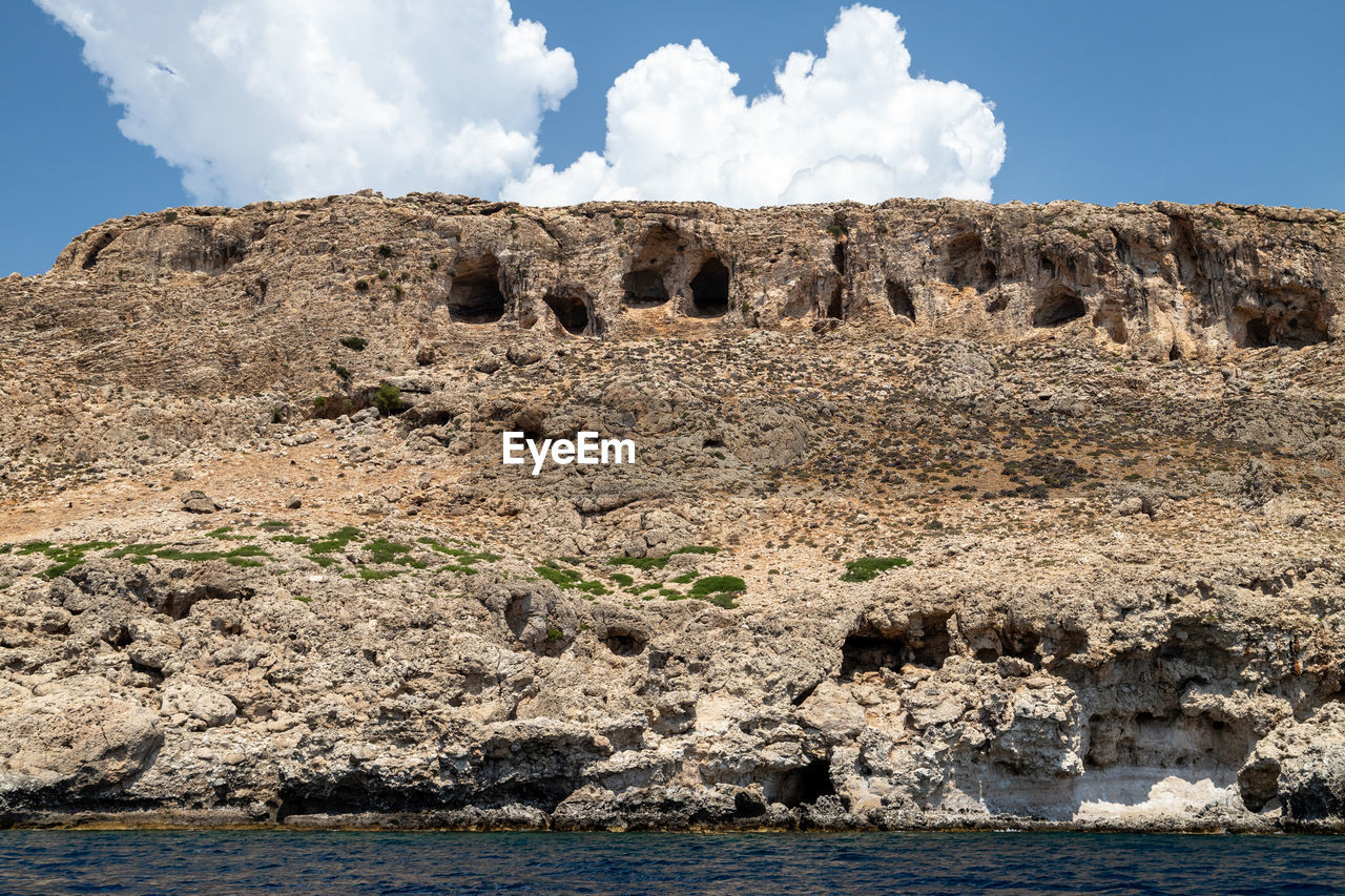 VIEW OF ROCK FORMATIONS ON LAND