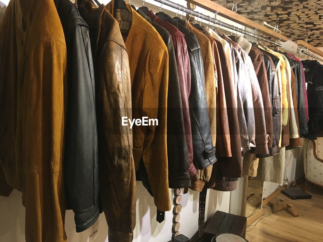 Jackets hanging on rack in store