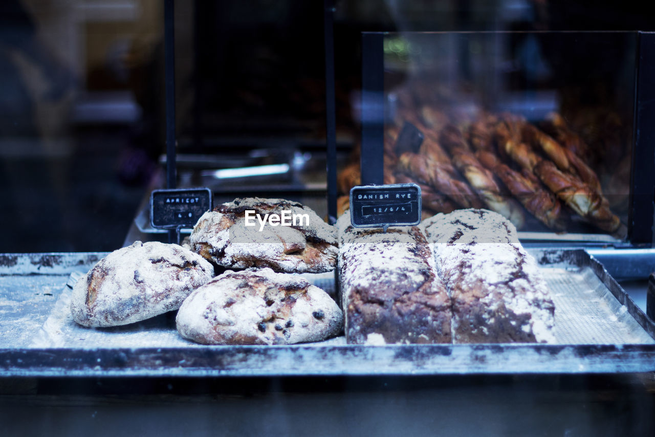 Close-up of backed food at market stall