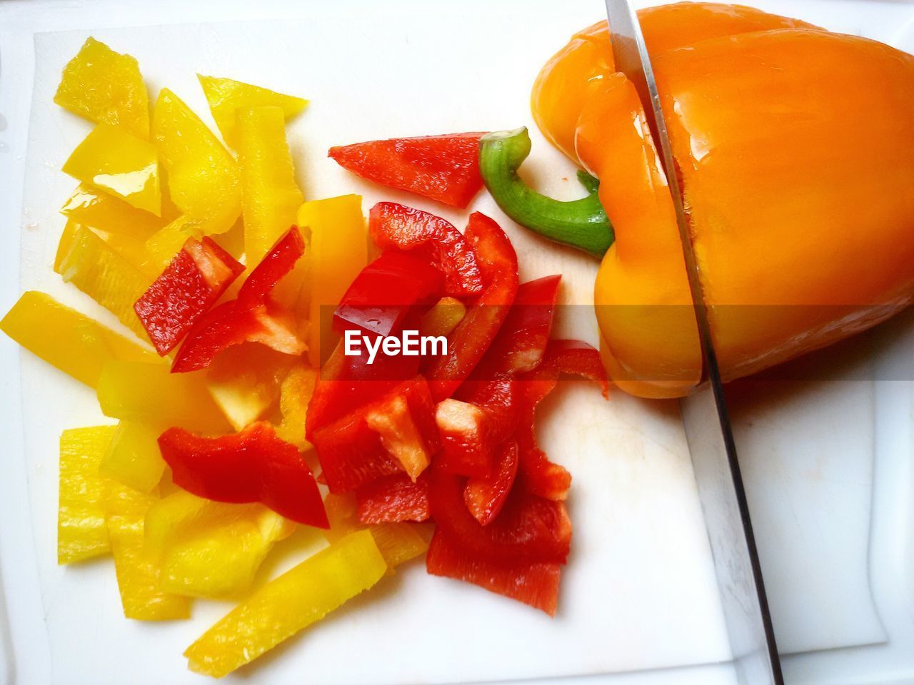 Close-up cutting peppers