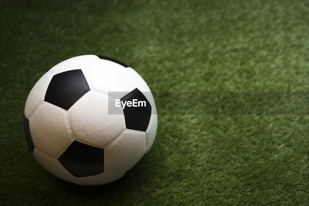 High angle view of soccer ball on grass