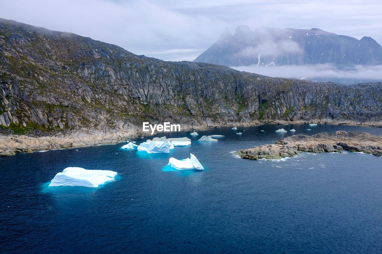 Majestic arctic landscape with sea against mountains