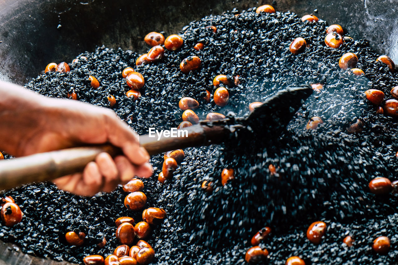 Close-up of person preparing food