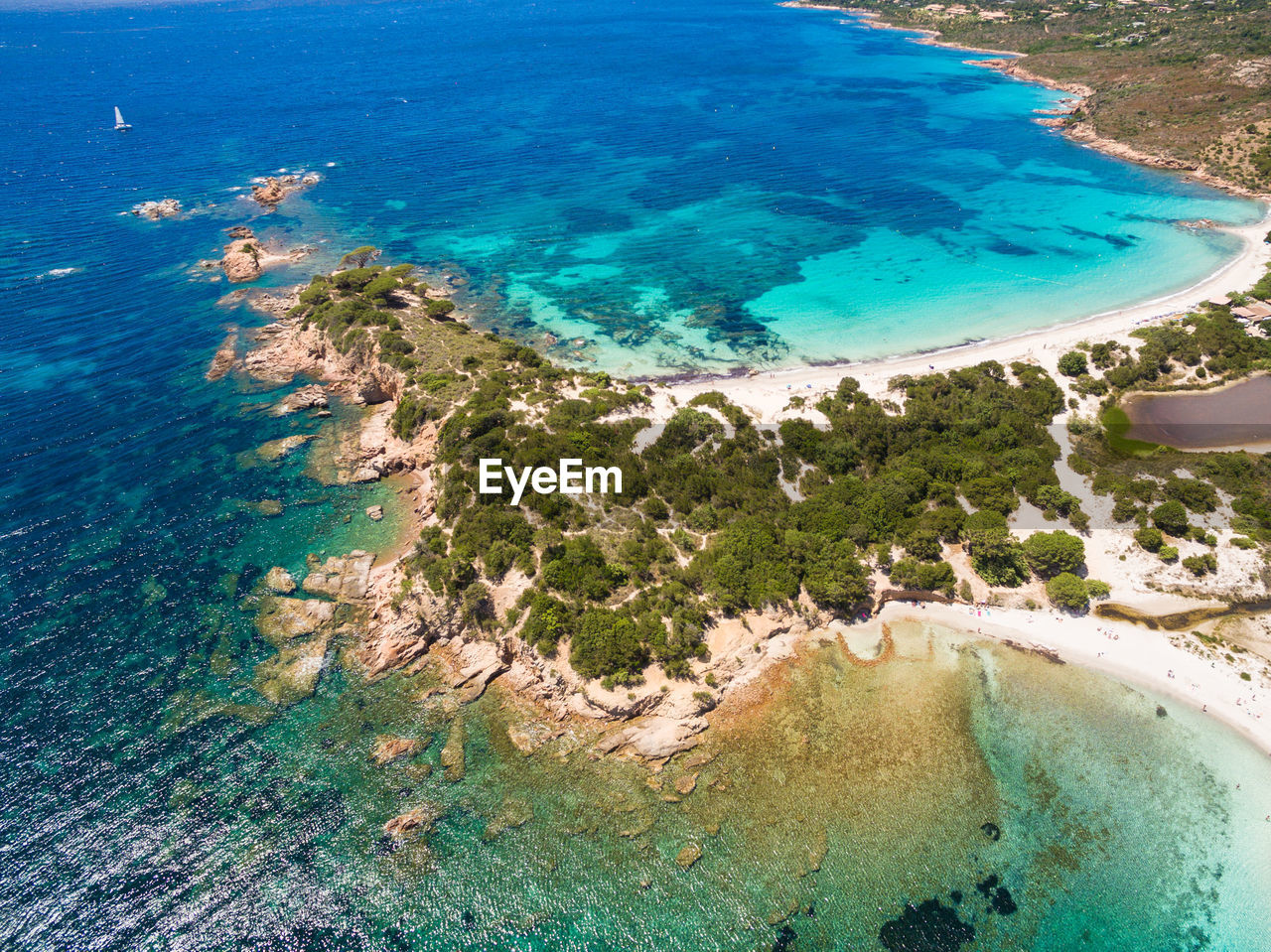 HIGH ANGLE VIEW OF SWIMMING POOL BY SEA