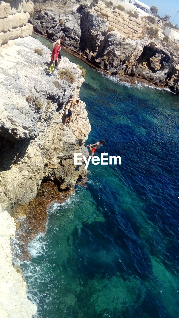 High angle view of rock formation in sea