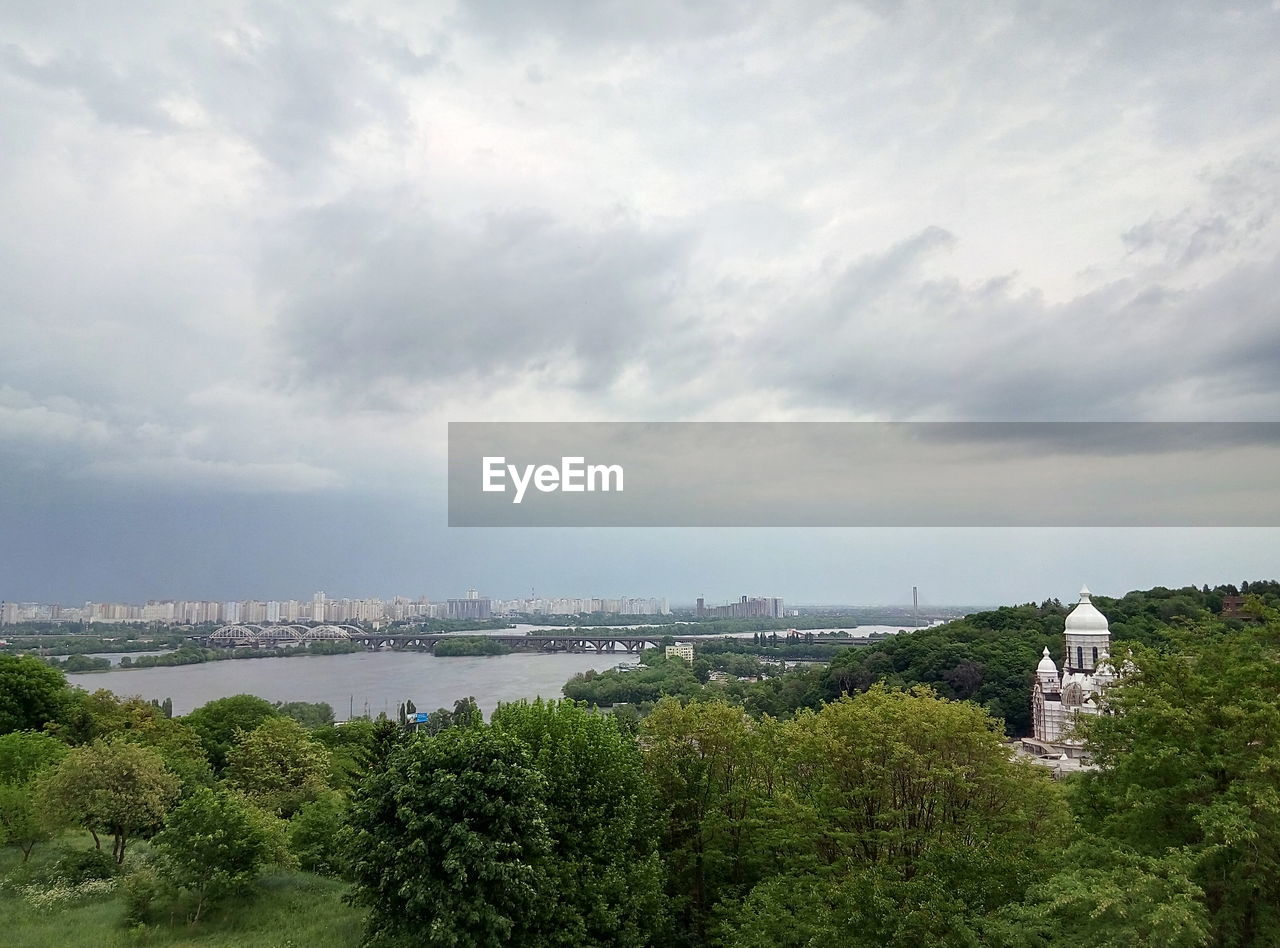 SCENIC VIEW OF RIVER BY TREES AGAINST SKY