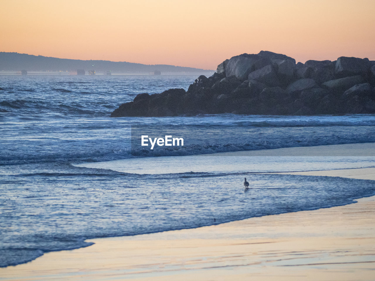 SCENIC VIEW OF SEA DURING SUNSET