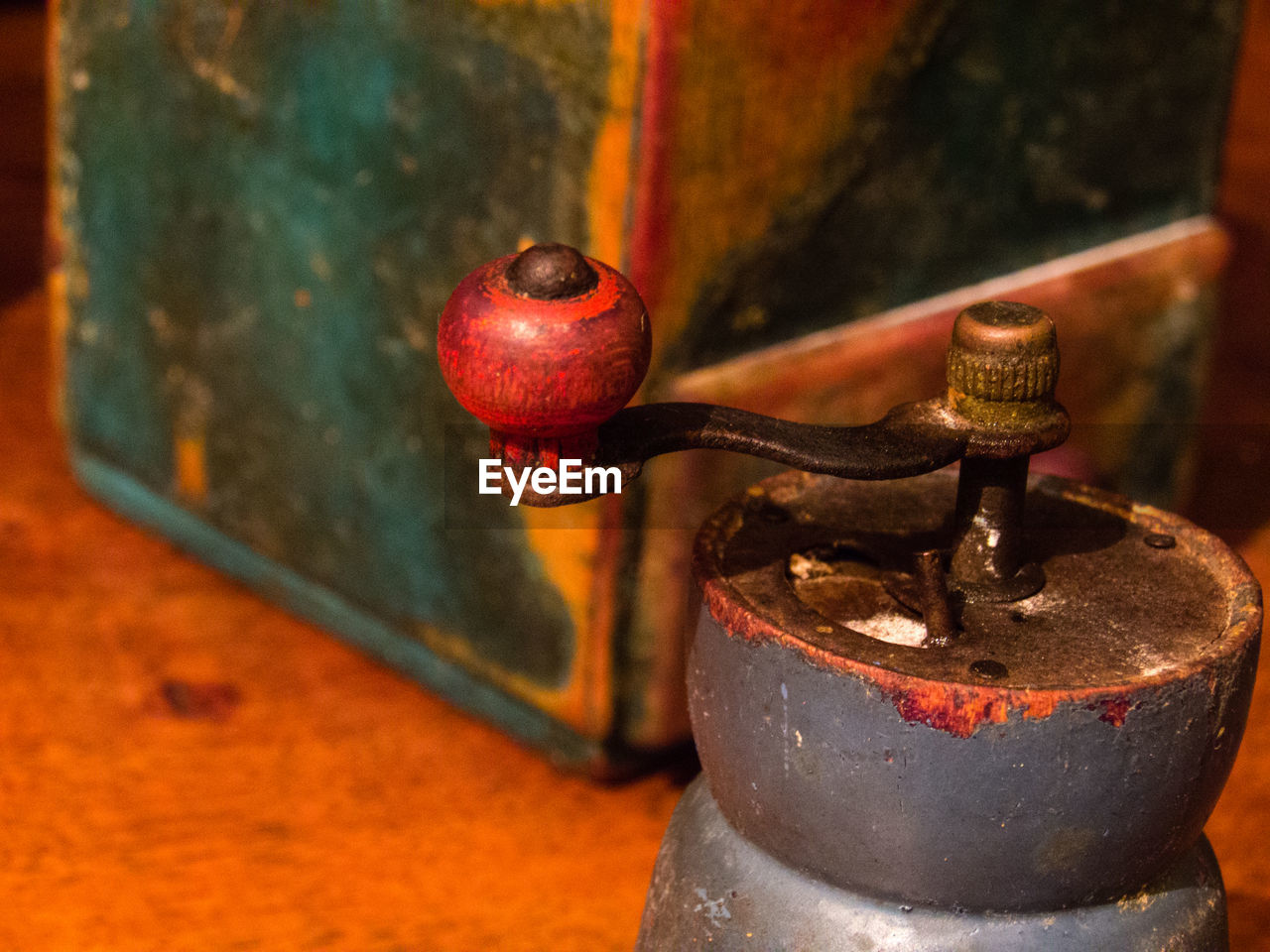 Close-up of coffee grinder on table