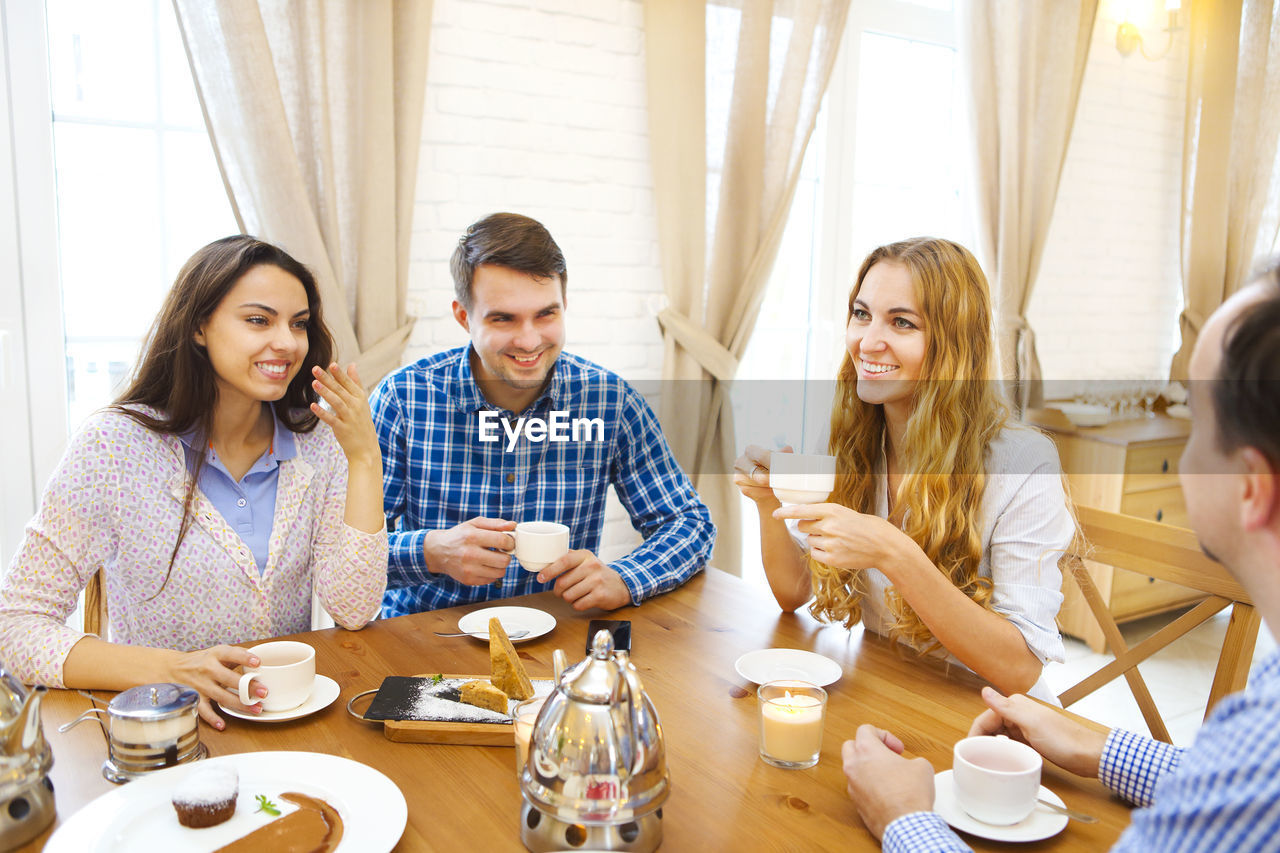 Group of people on table