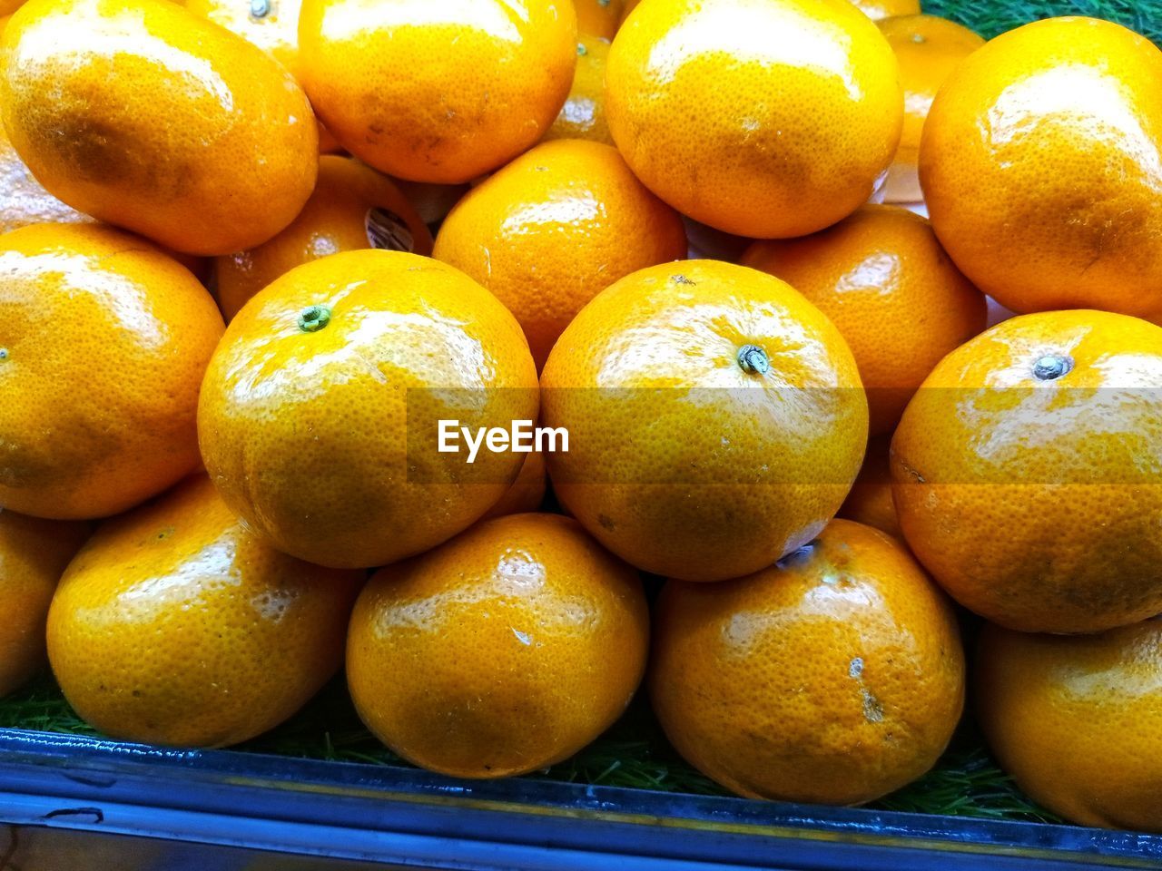 full frame shot of oranges in market