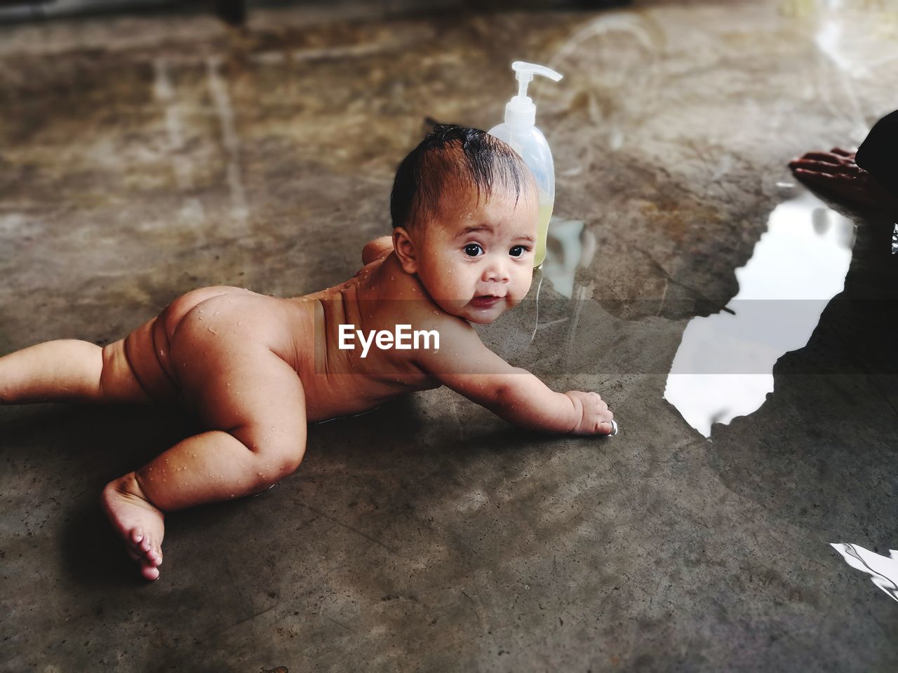 High angle view of baby boy taking bath