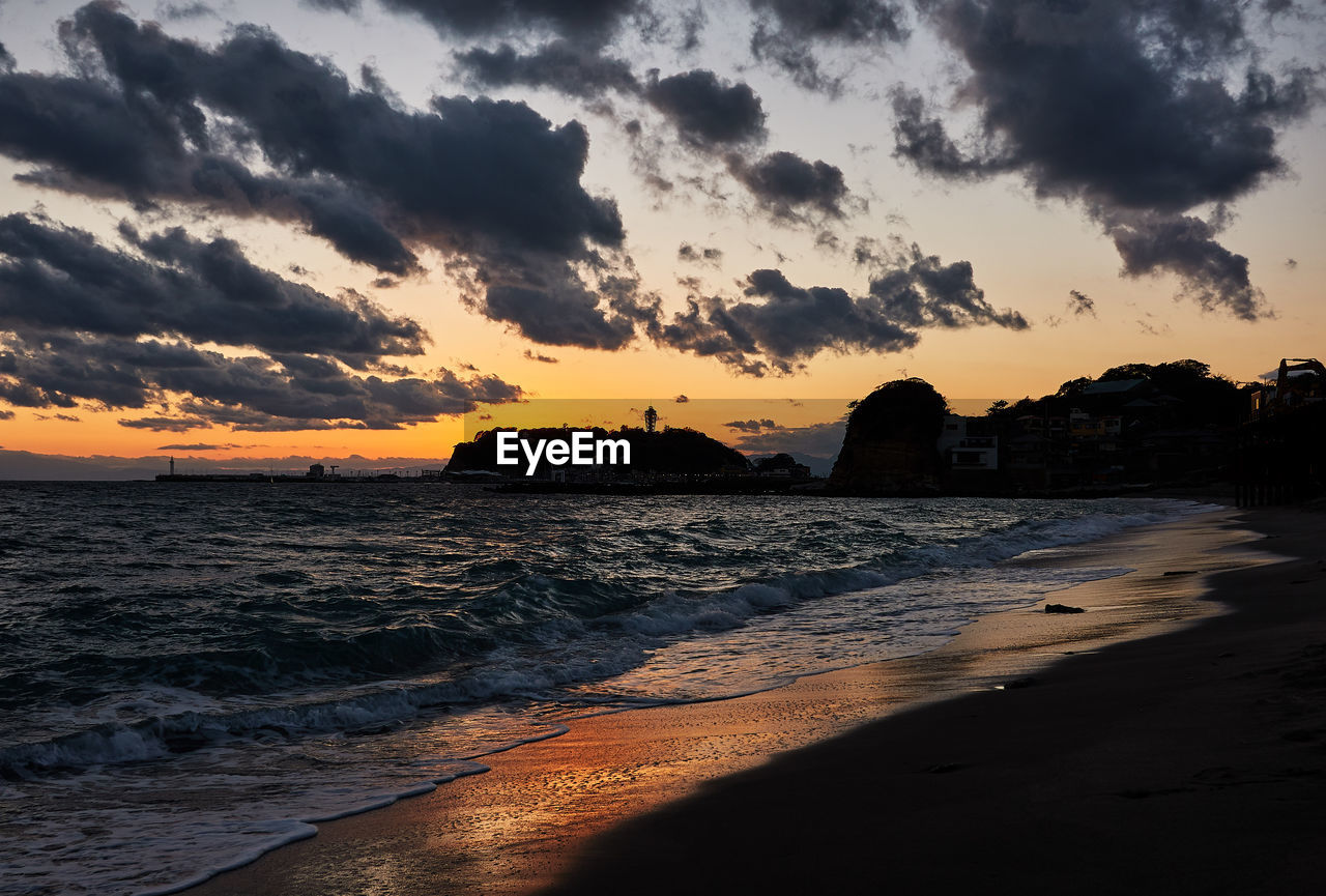 Scenic view of sea against sky during sunset