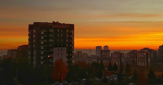 VIEW OF SUNSET OVER CITY