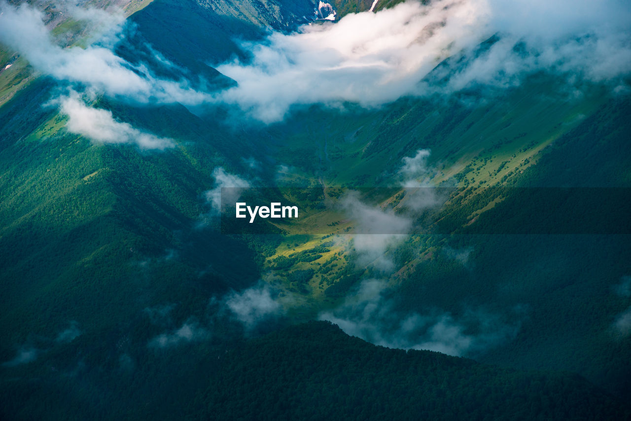 Aerial view of mountains against sky